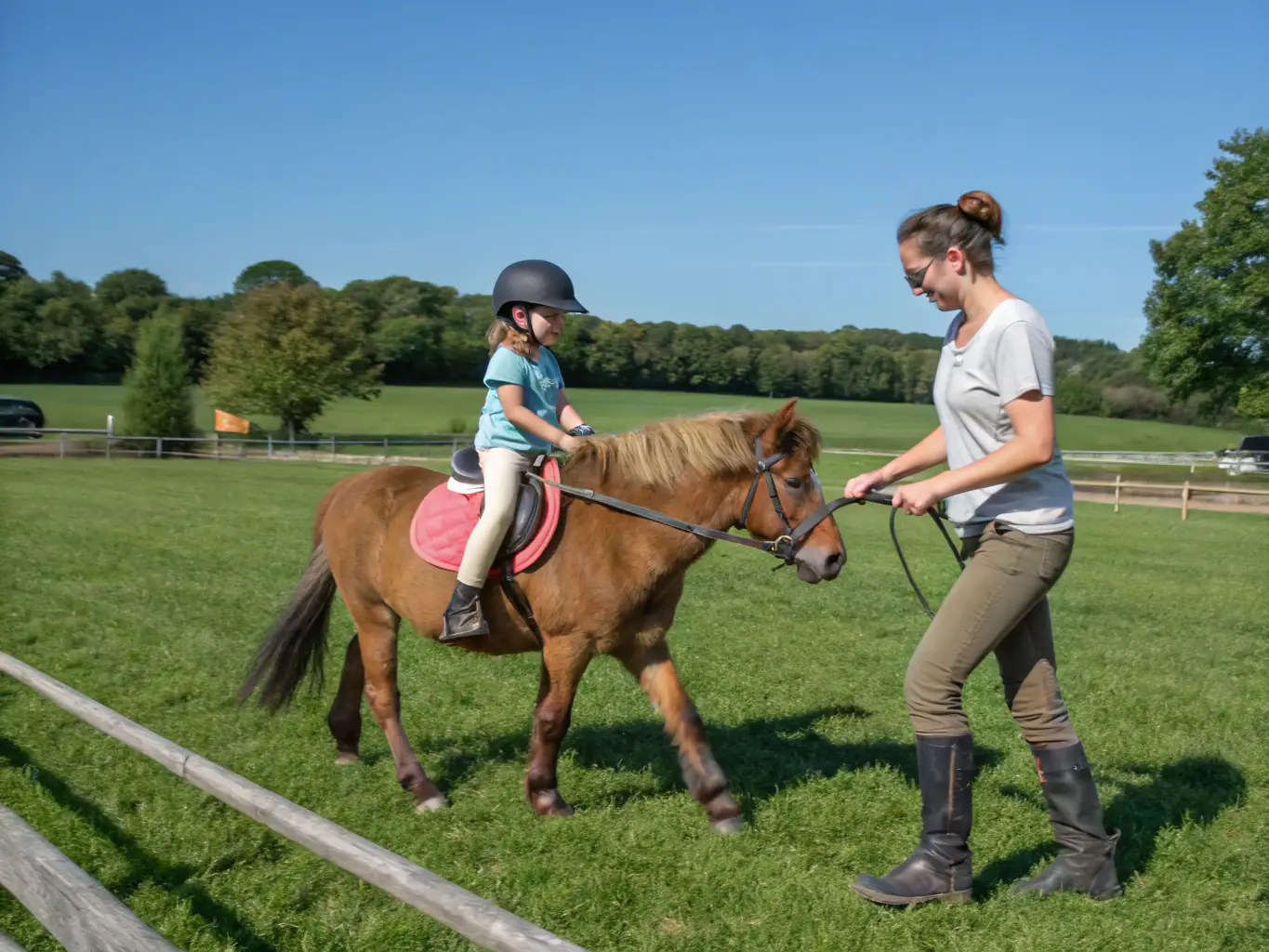 A young member confidently riding a pony during a recreational session at ASSOCIATION DU PONEY CLUB VAL LOYER, highlighting the personal growth and confidence-building aspects of equestrian activities.